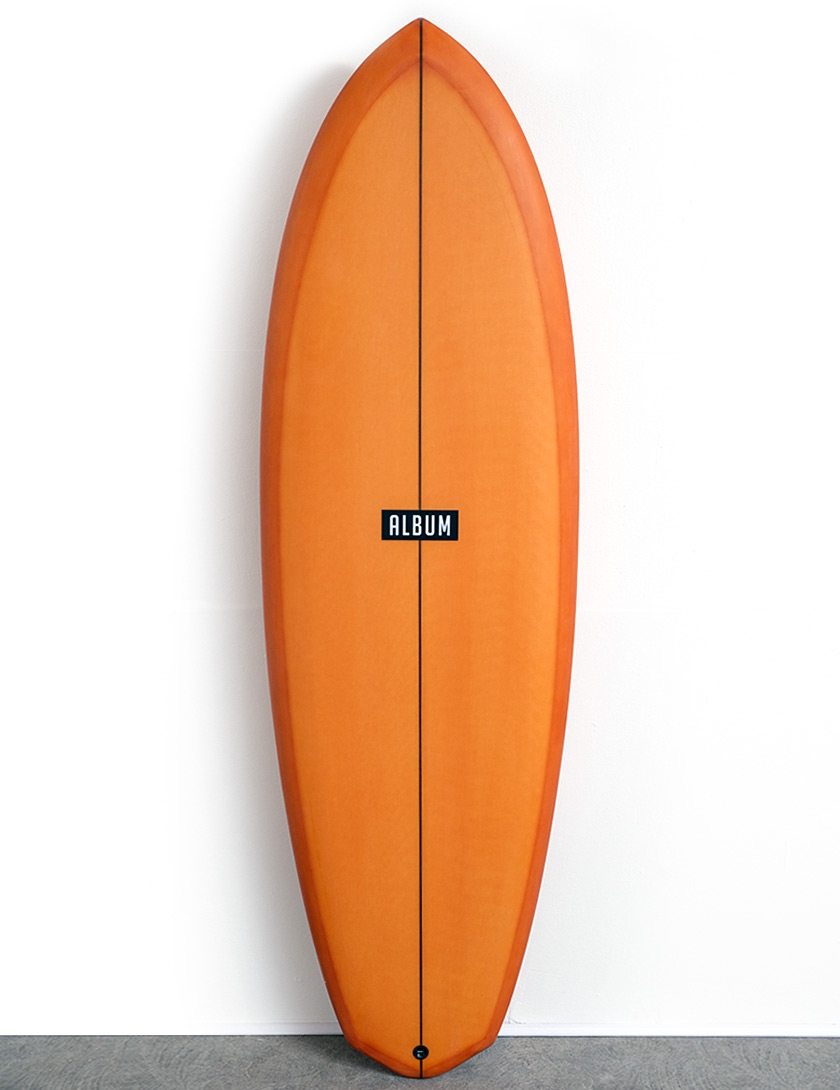 burnt orange surfboard