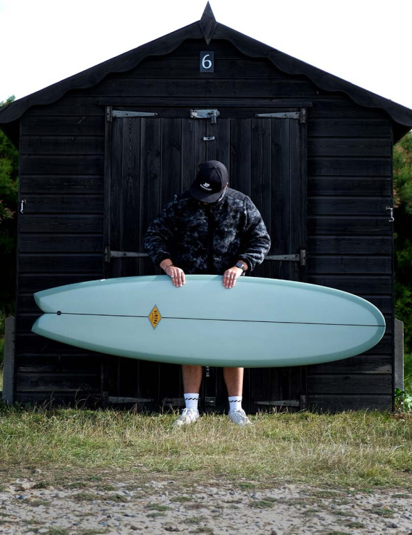 Almond Big Bueno Fish Surfboard 7ft 0 Futures - Orange Resin Tint