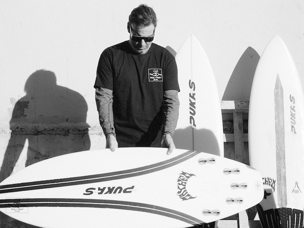 Matt Biolos with The Pukas Link Surfboard